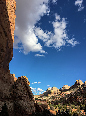 Sandstone and Passing Clouds